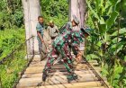 Karya Bakti TNI Rehabilitasi Jembatan Gantung Sepanjang 60 Meter di Desa Lenggo